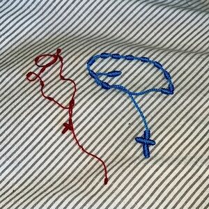 Two handmade braided adjustable bracelets